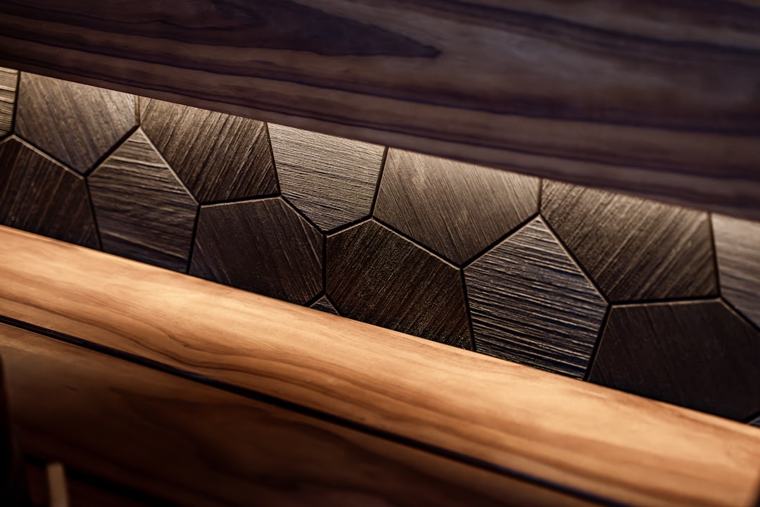Close-up of warm walnut and oak with matte, tactile finish