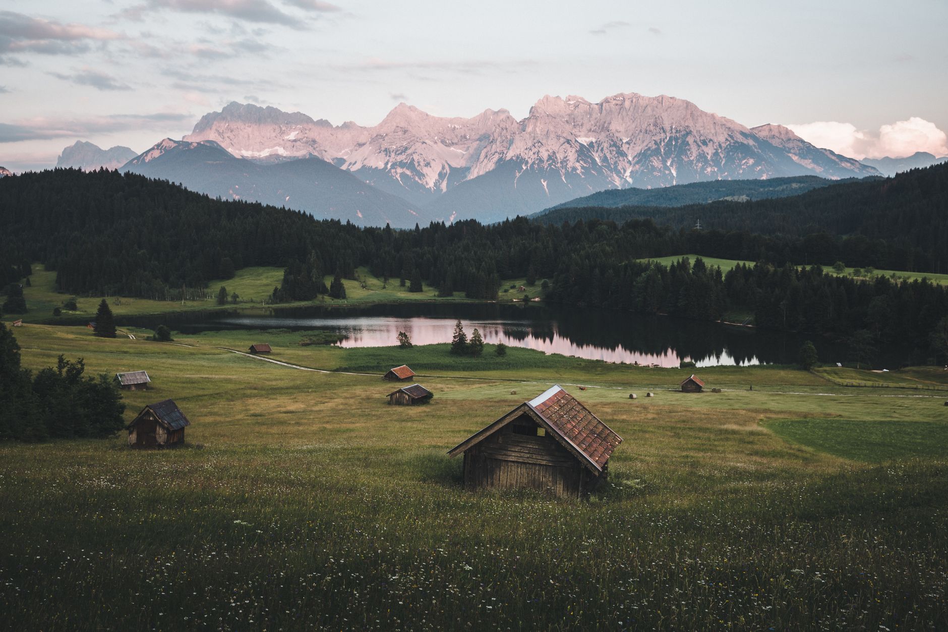 Pastures, alpine huts and a lake in front of the Karwendel near Krün in the Werdenfelser Land