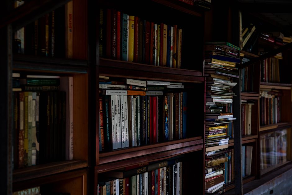 Your library is the portrait you shape from paper and linen