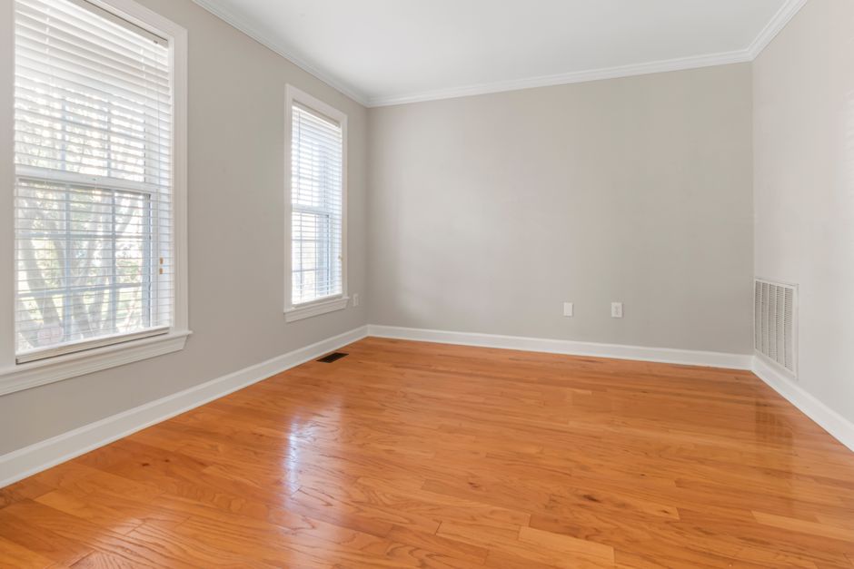 Bright period interior with ceiling cornice and window light